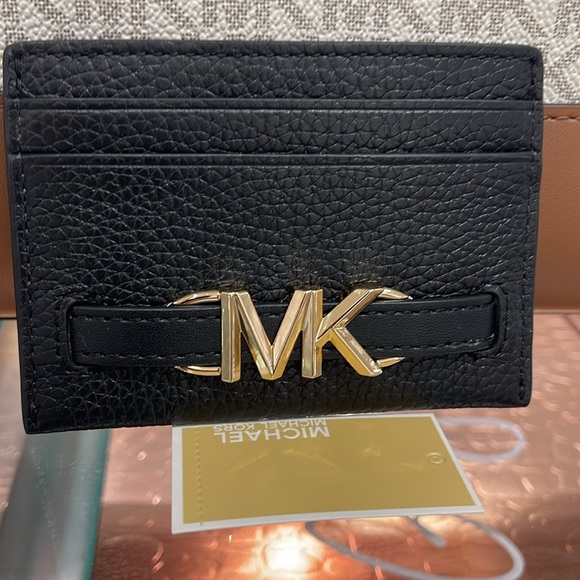 MICHAEL KORS
Reed Large Pebbled Leather Card Holder Case Wallet 
COLOR BLACK
NWT - Picture 5 of 16